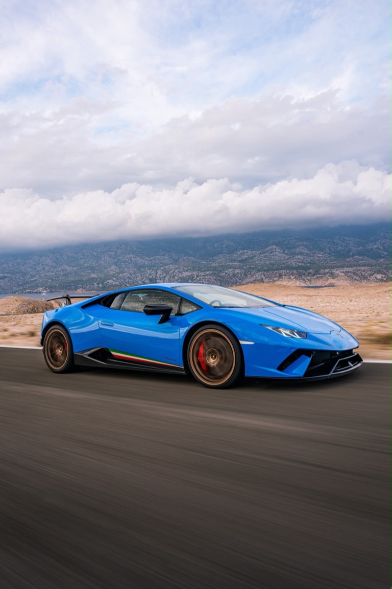 Side profile at speed, with the Adriatic coastline behind.
